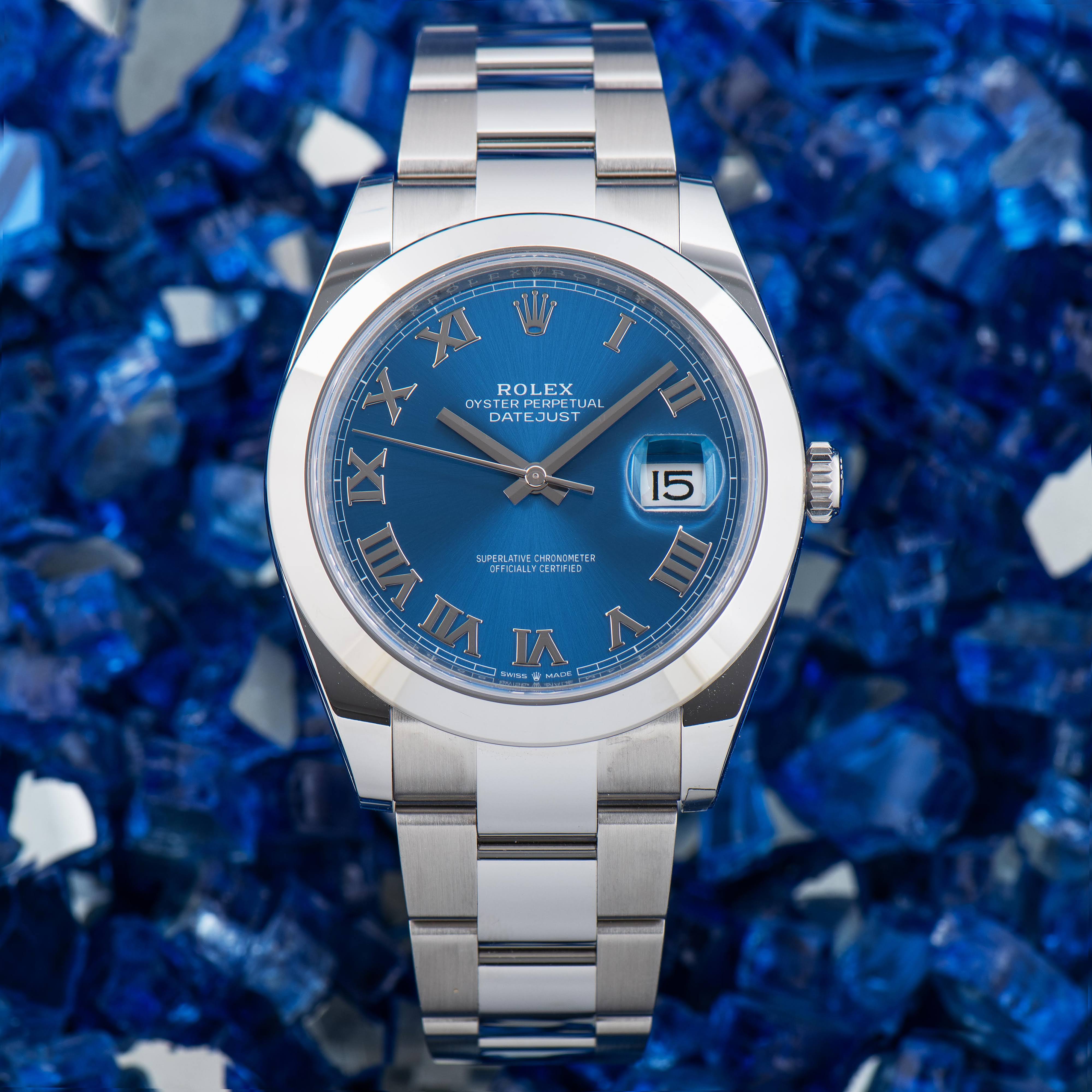Close-up of a genuine Rolex Datejust 41 azzurro blue Roman dial and smooth bezel on an Oyster bracelet